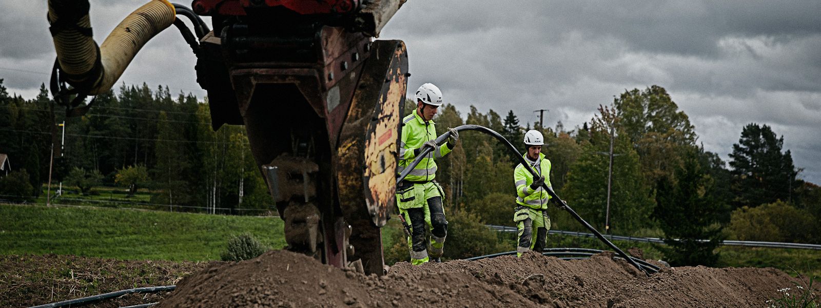 Cable workers installing a medium voltage cable